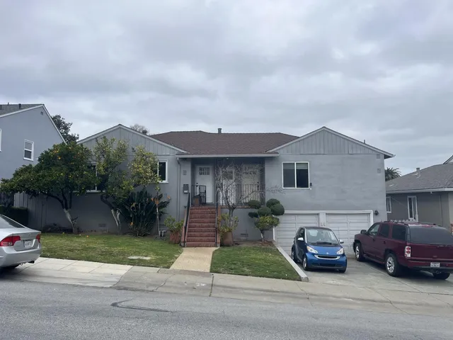 a car parked in front of a house