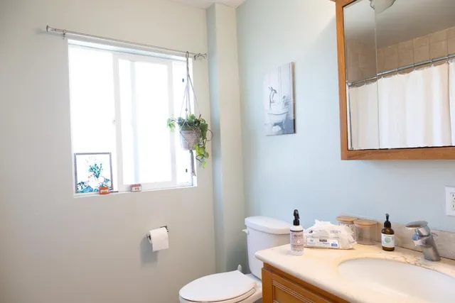 a bathroom with a sink and a toilet