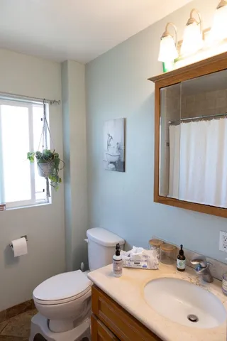 a bathroom with a sink and a toilet