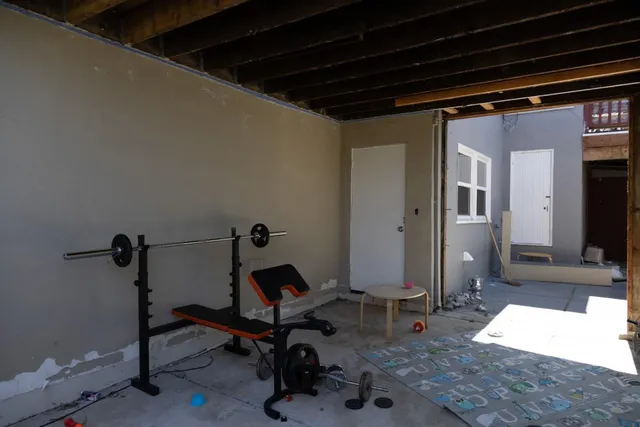 a view of a room with gym equipment
