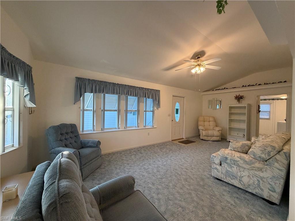 4680 Washington Way West Estero, FL 33928 - Photo 6 of 19 a living room with furniture and windows