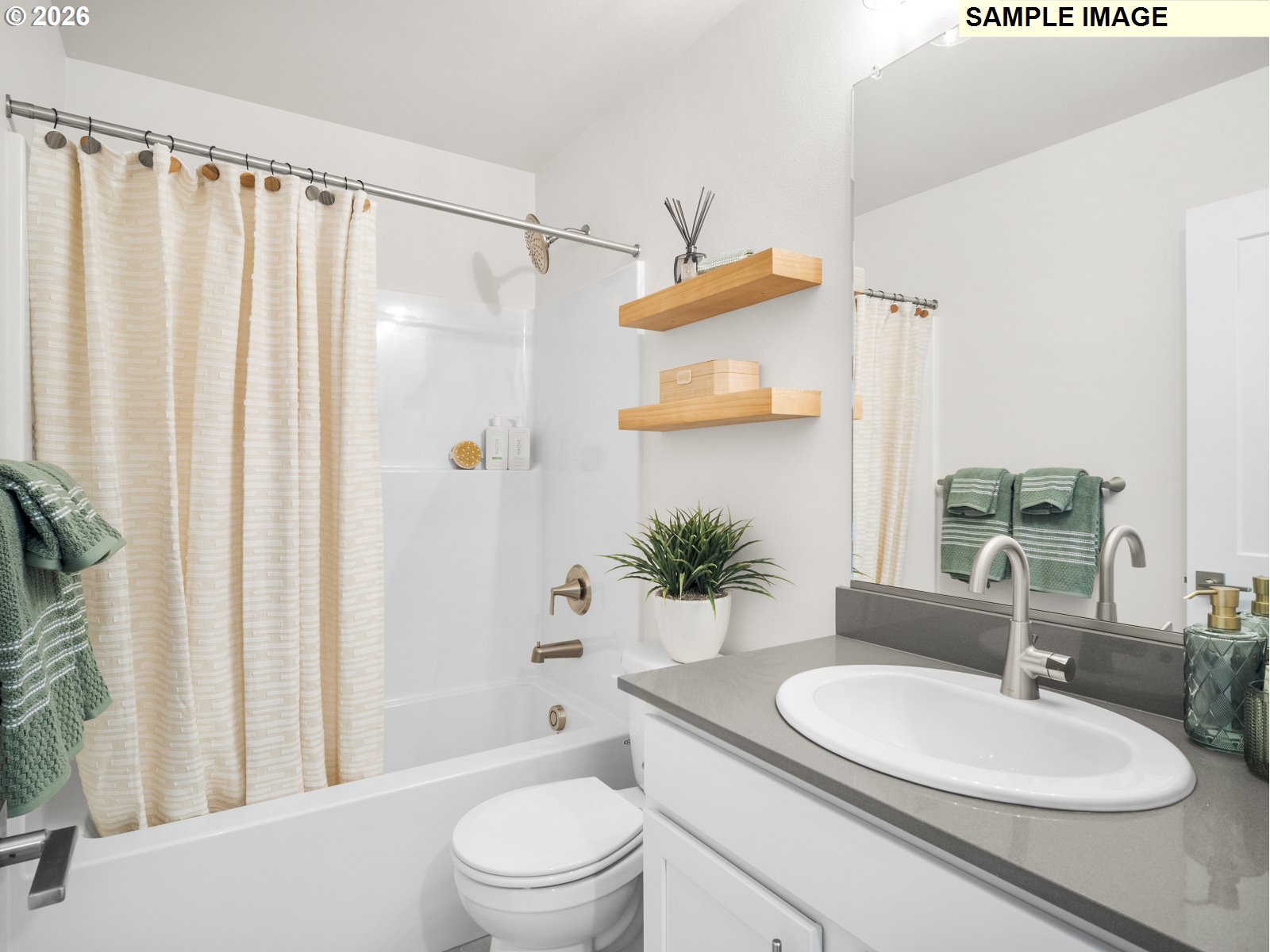 18212 Southwest Tippery Lane Beaverton, OR 97003 - Photo 23 of 29 a bathroom with a granite countertop sink toilet a mirror a vanity and shower