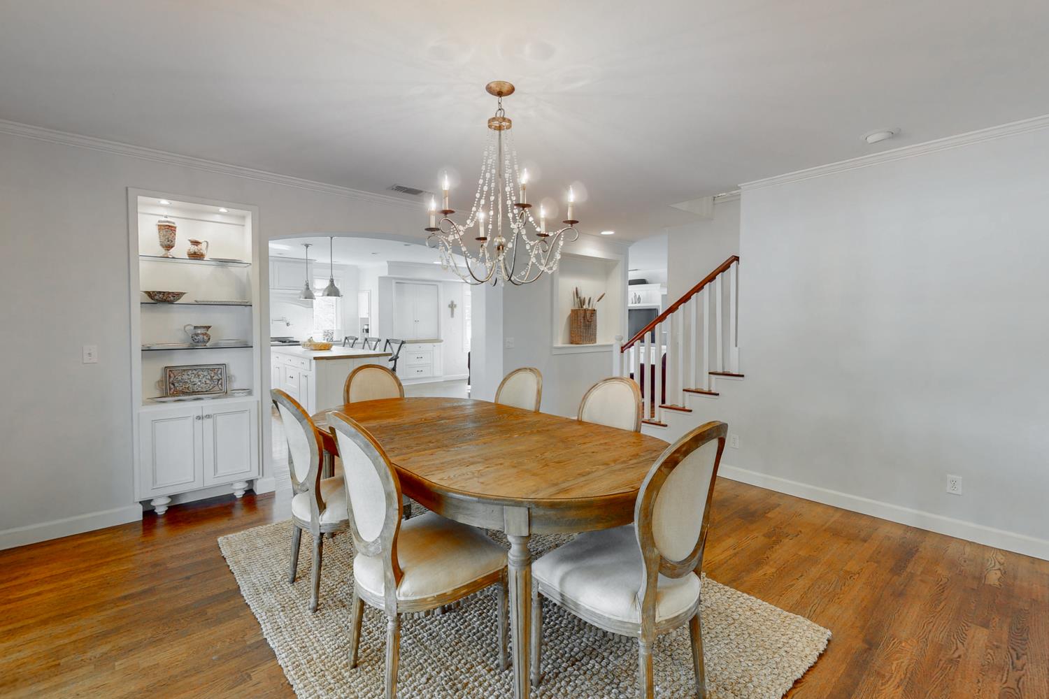 332 Wilson Road Yuba City, CA 95991 - Photo 15 of 91 a dining room with furniture a chandelier and wooden floor