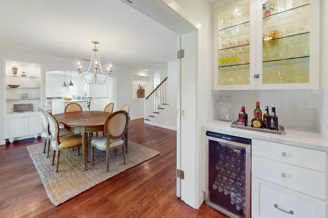 a bedroom with a bed and flat screen tv