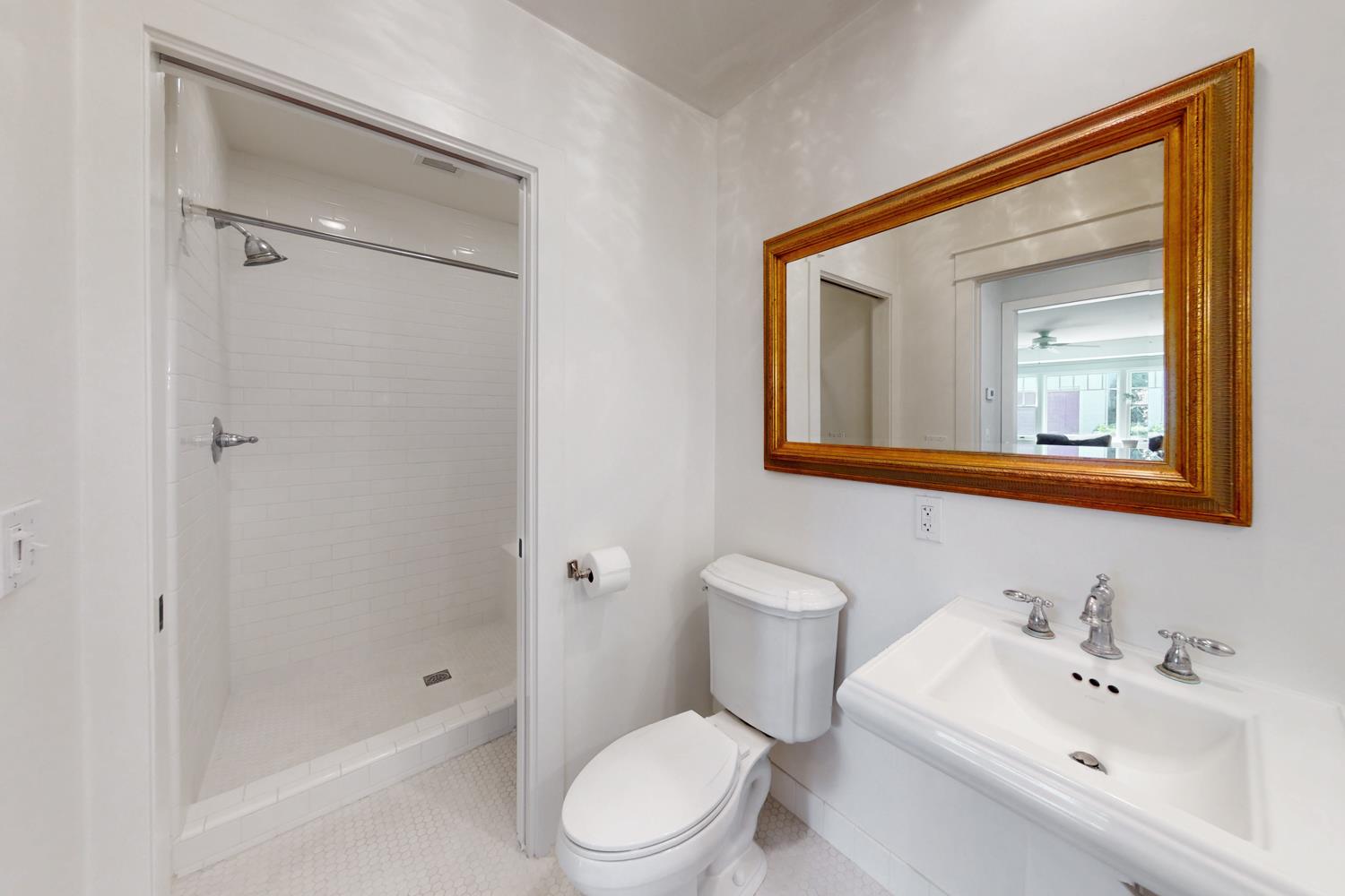 332 Wilson Road Yuba City, CA 95991 - Photo 36 of 91 a bathroom with a toilet sink vanity tub and shower
