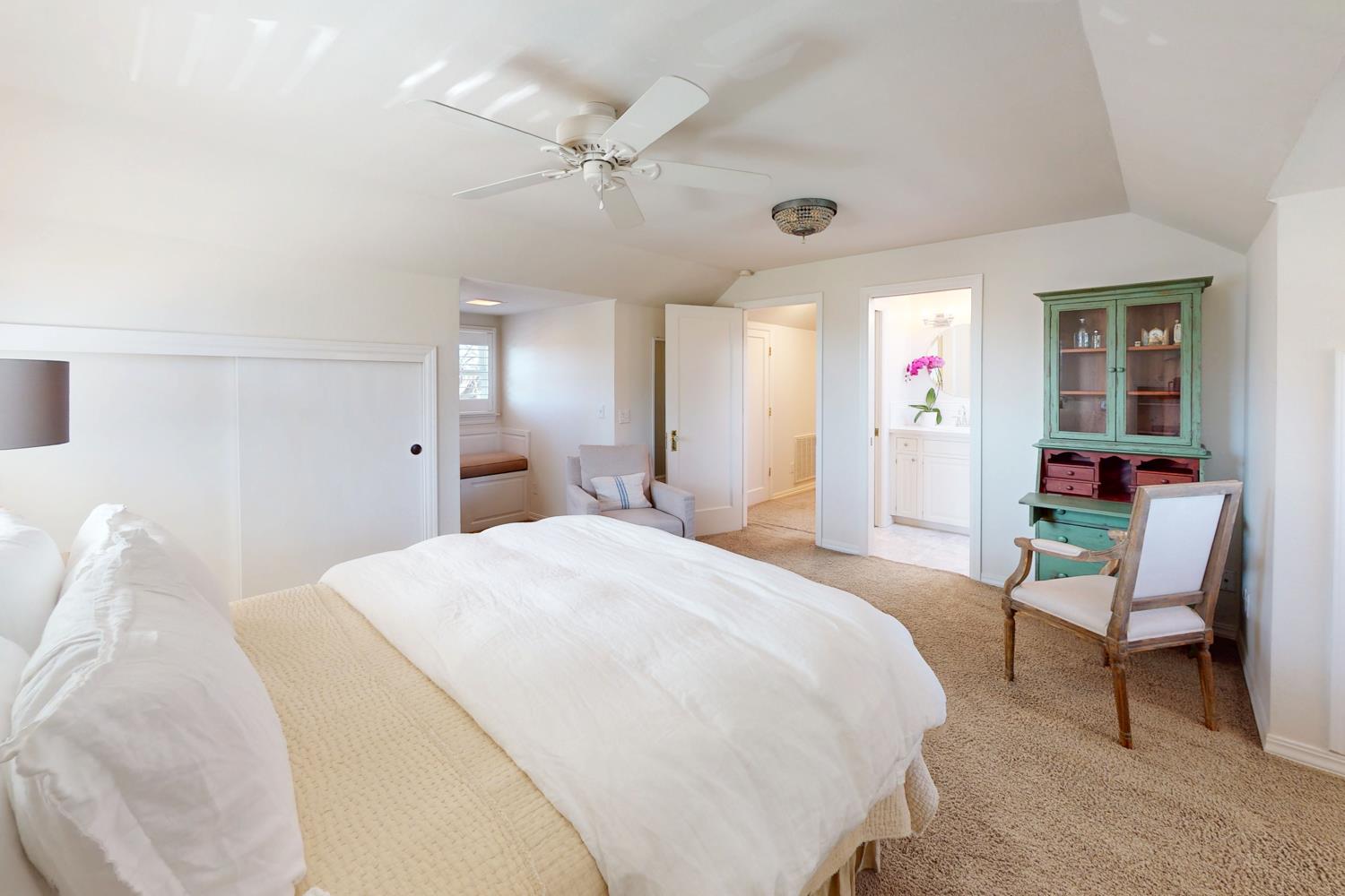 332 Wilson Road Yuba City, CA 95991 - Photo 48 of 91 a spacious bedroom with a bed and a chandelier