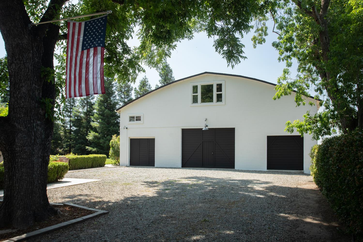 332 Wilson Road Yuba City, CA 95991 - Photo 52 of 91 a front view of a house with a yard and garage