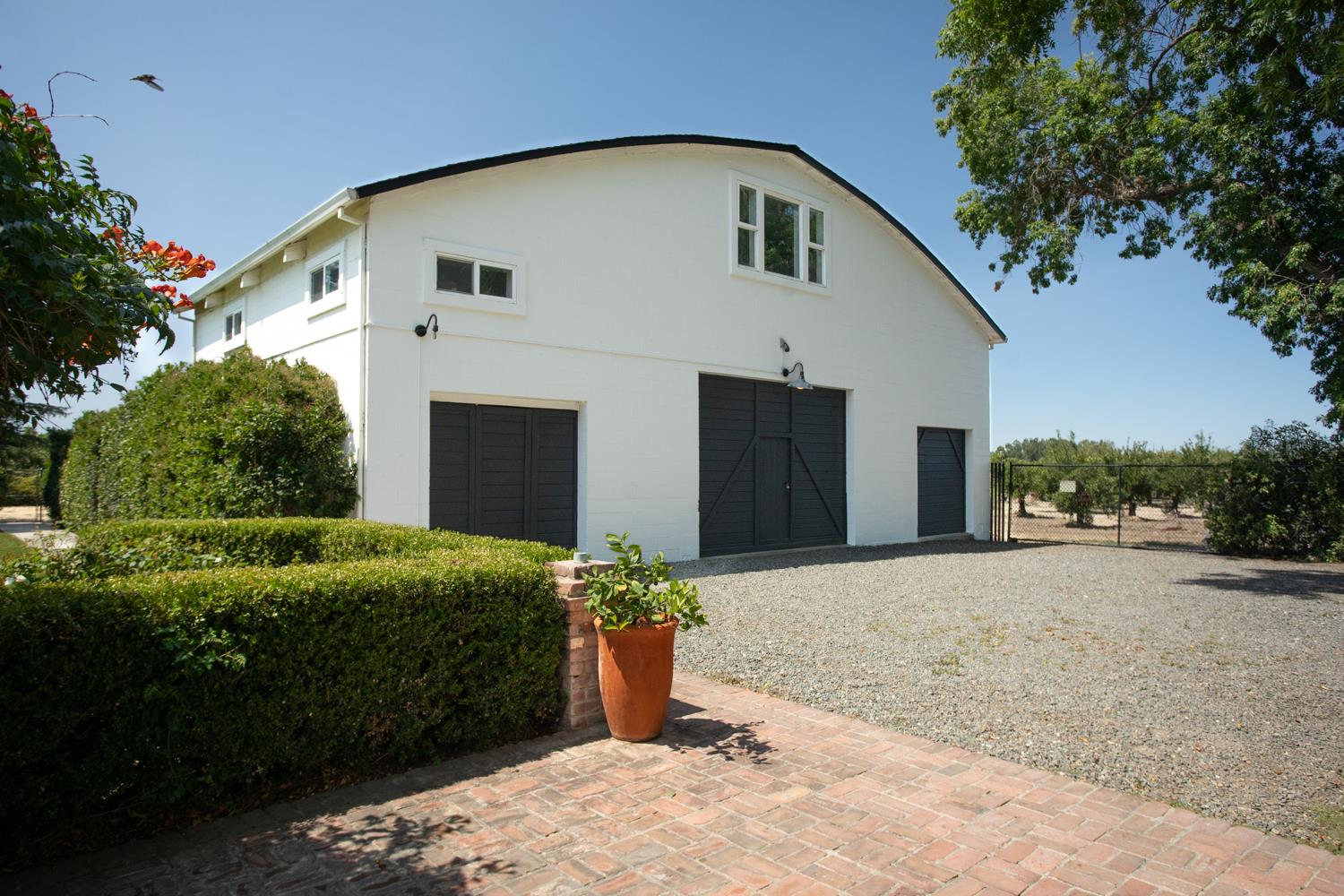 332 Wilson Road Yuba City, CA 95991 - Photo 53 of 91 a front view of a house with a yard and garage