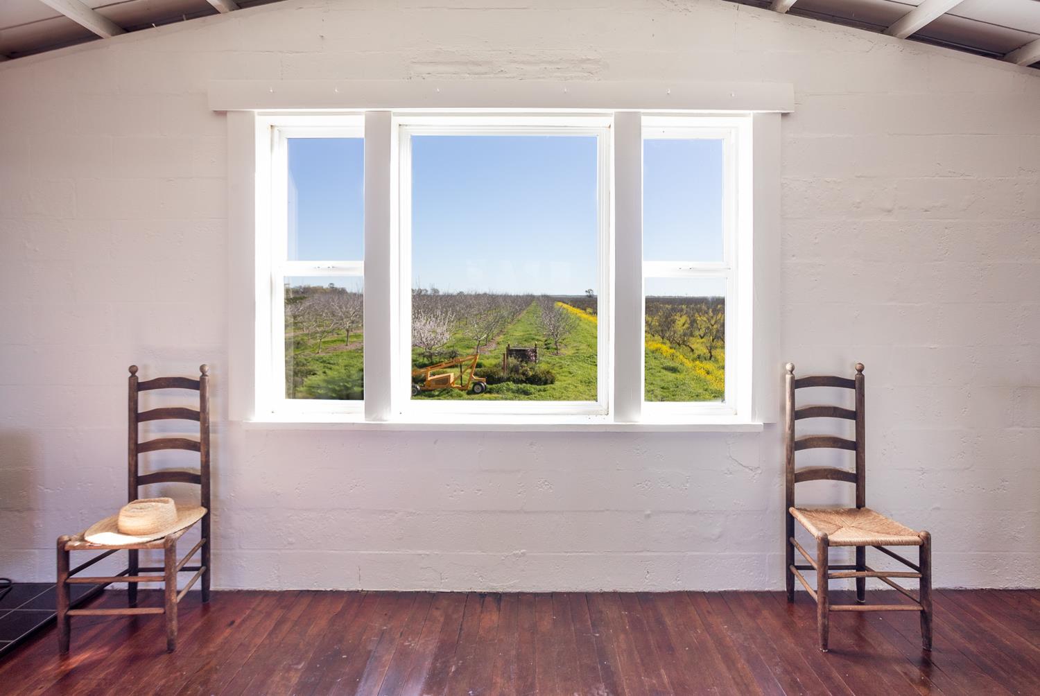 332 Wilson Road Yuba City, CA 95991 - Photo 66 of 91 a view of a room with wooden floor and a window
