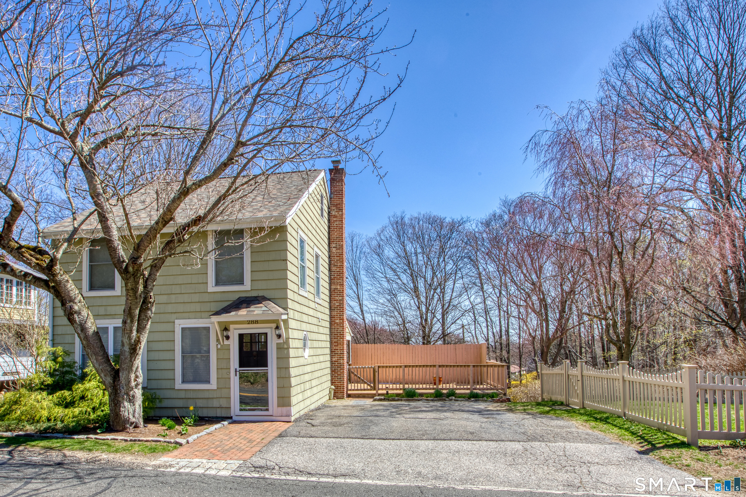 288 Wheeler Road Monroe, CT 06468 - Photo 1 of 1 a view of a white house with a large tree