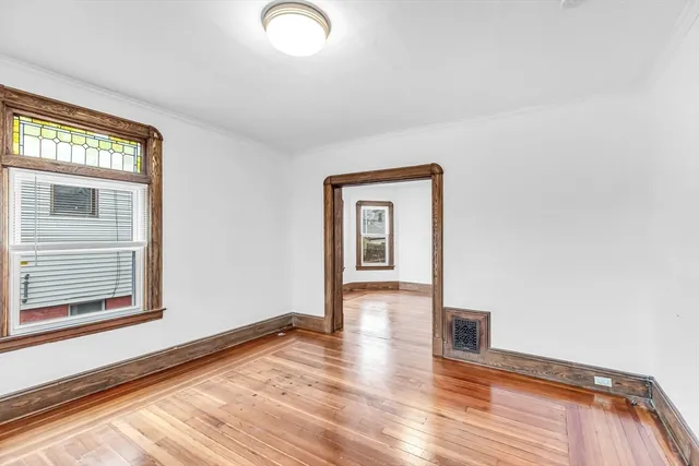 a view of an empty room and window