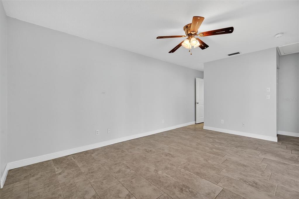 321 Windrush Loop Tarpon Springs, FL 34689 - Photo 20 of 47 a view of an empty room