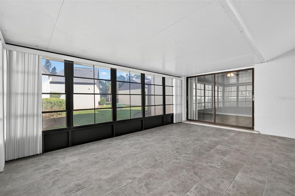 321 Windrush Loop Tarpon Springs, FL 34689 - Photo 32 of 47 an empty room with windows