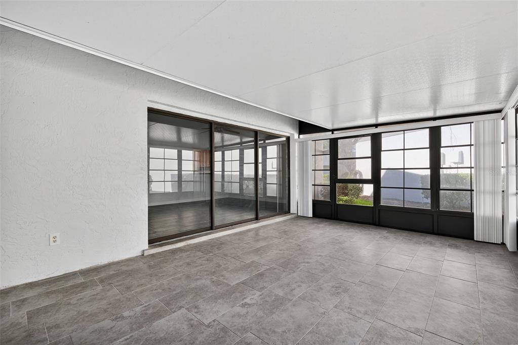 321 Windrush Loop Tarpon Springs, FL 34689 - Photo 34 of 47 a view of an empty room with a window