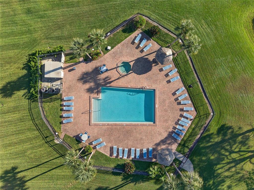 321 Windrush Loop Tarpon Springs, FL 34689 - Photo 38 of 47 an aerial view of a house with a garden