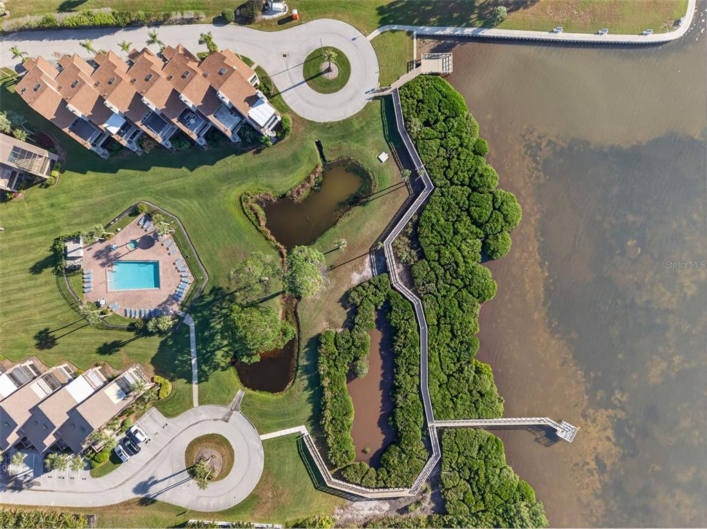 321 Windrush Loop Tarpon Springs, FL 34689 - Photo 41 of 47 an aerial view of a house with a swimming pool