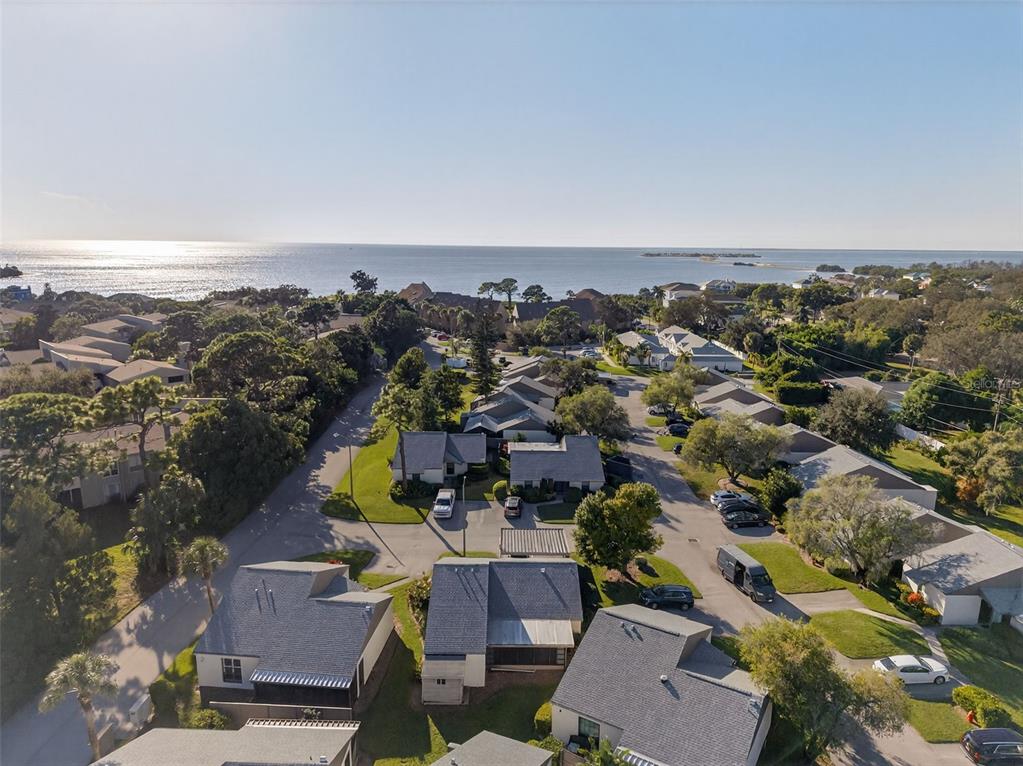 321 Windrush Loop Tarpon Springs, FL 34689 - Photo 44 of 47 an aerial view of a city with lots of residential buildings