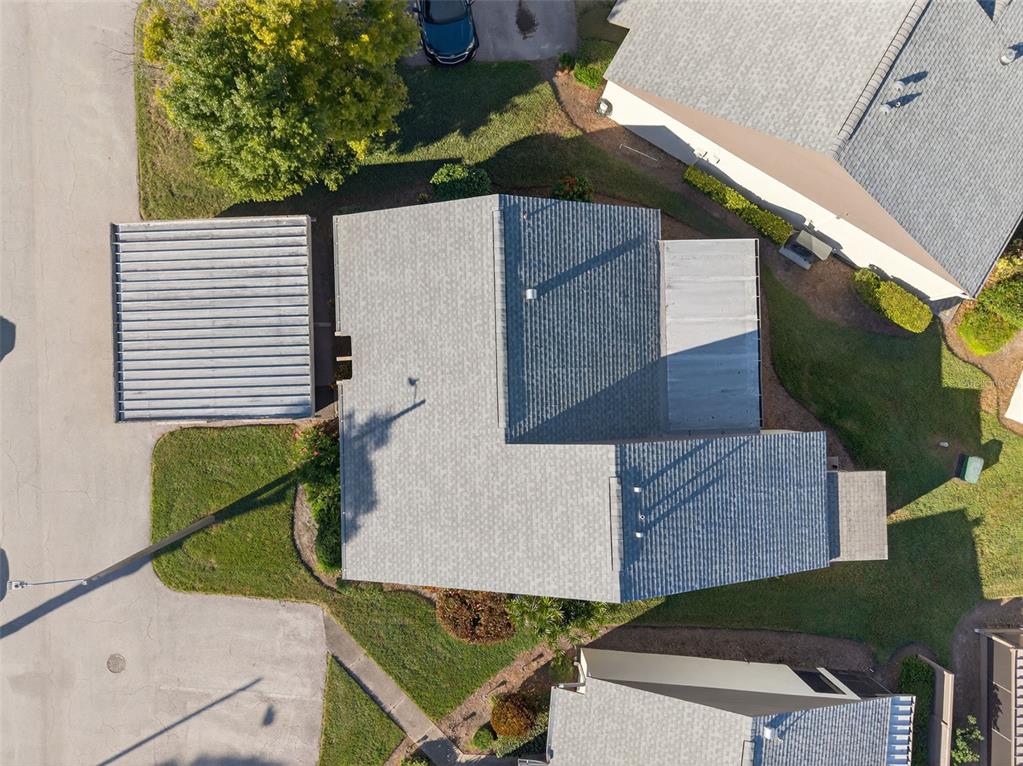 321 Windrush Loop Tarpon Springs, FL 34689 - Photo 45 of 47 an aerial view of a house with a yard
