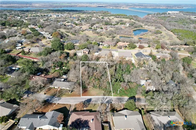 an aerial view of a city with lots of residential buildings