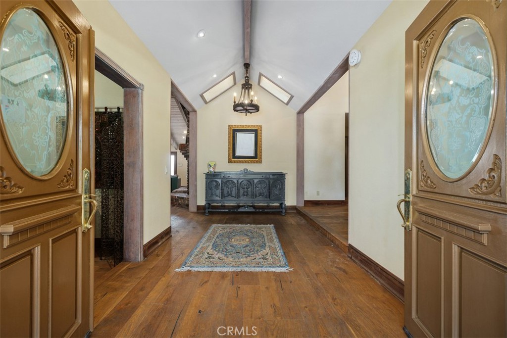27777 Sycamore Mesa Road Temecula, CA 92590 - Photo 14 of 72 Entry with rich wood flooring and skylights