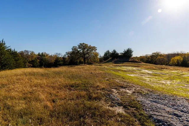 a view of lake with green space