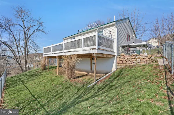 a house view with a backyard space