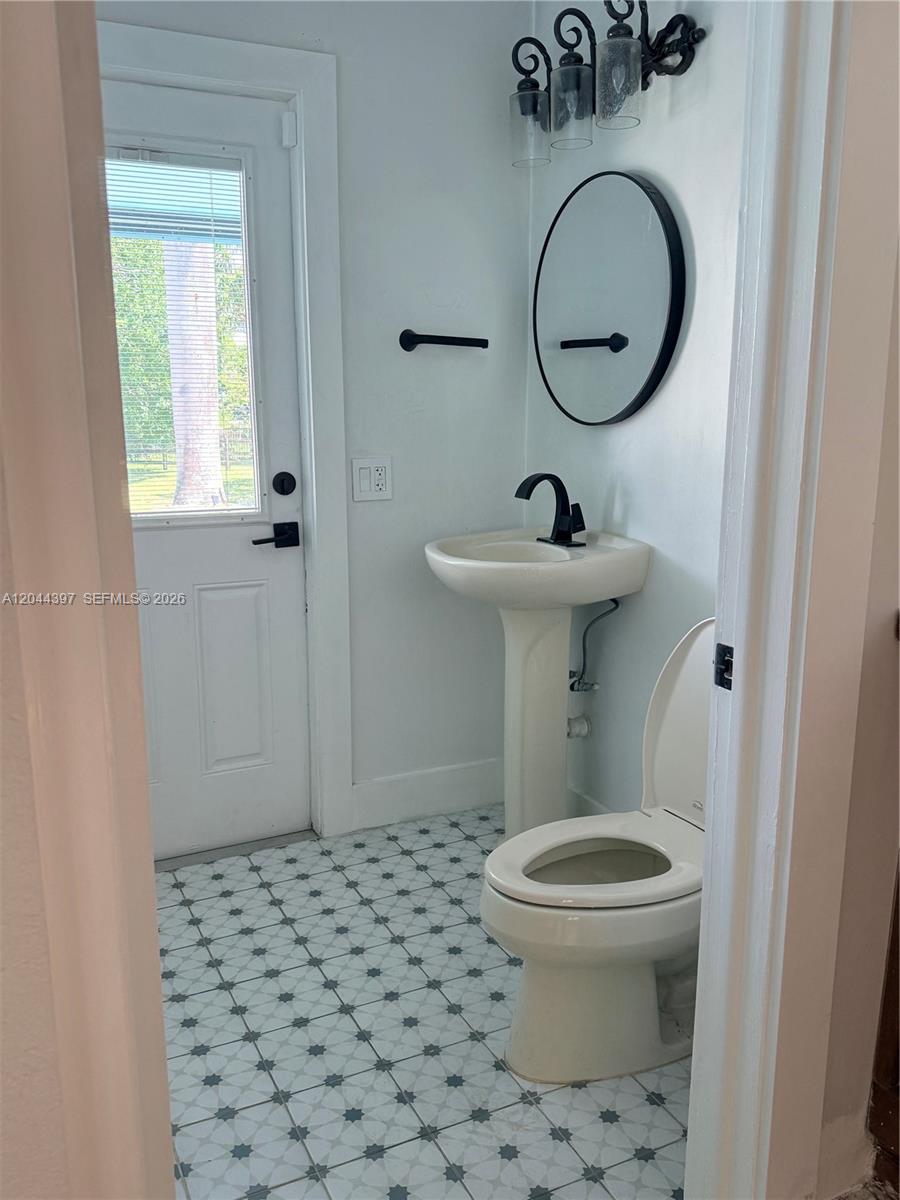 20501 Southwest 50th Place Southwest Ranches, FL 33332 - Photo 11 of 20 Bathroom 1 on ground floor with exterior door