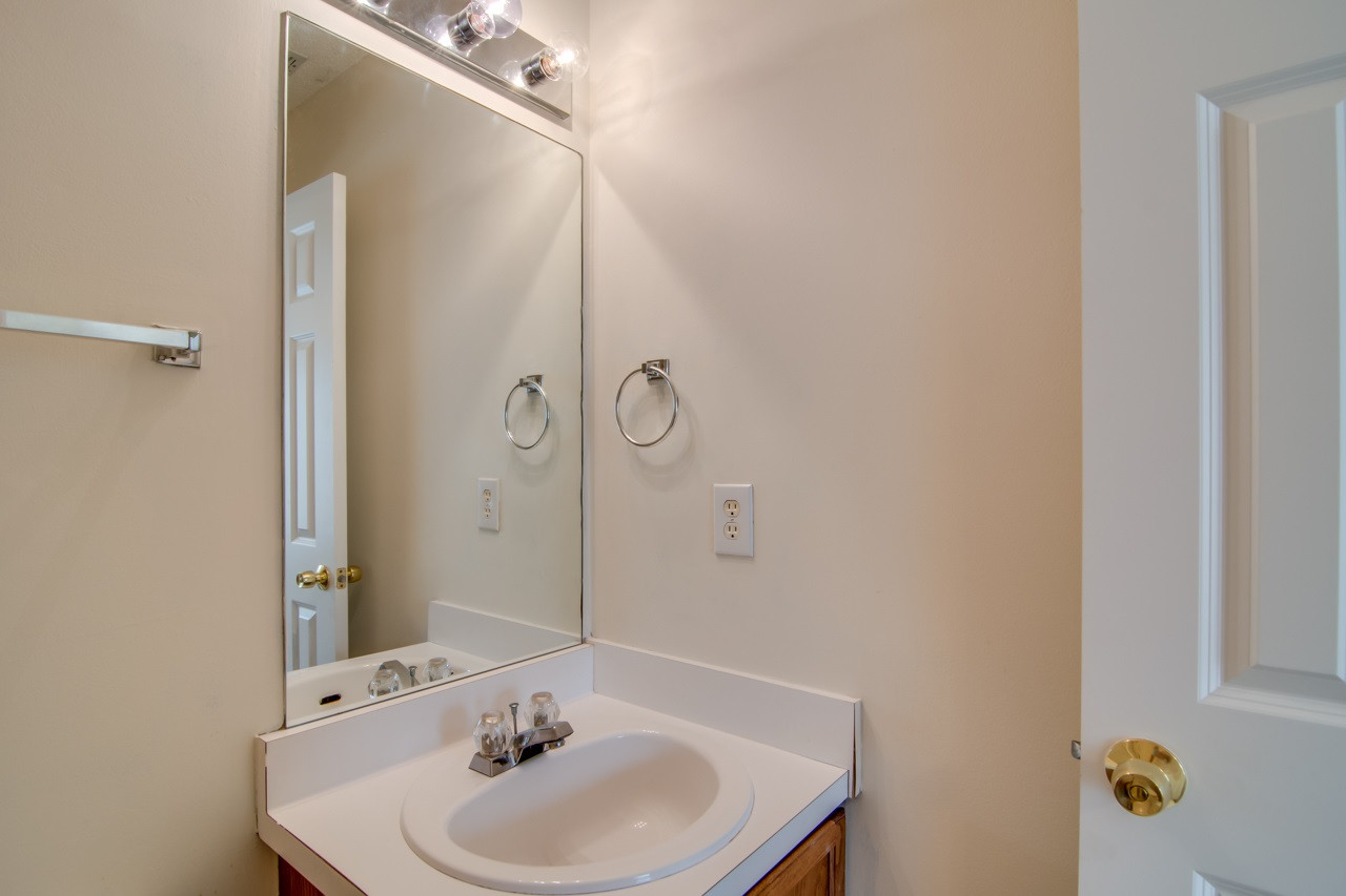 5008 Gable Ridge Drive Durham, NC 27713 - Photo 17 of 20 a bathroom with a sink and shower