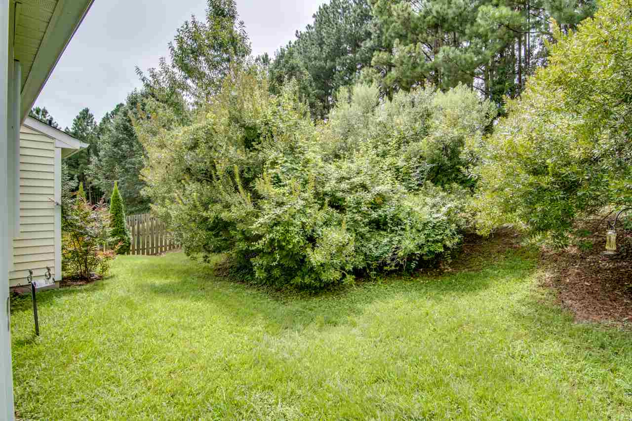 5008 Gable Ridge Drive Durham, NC 27713 - Photo 19 of 20 a view of an outdoor space and a yard