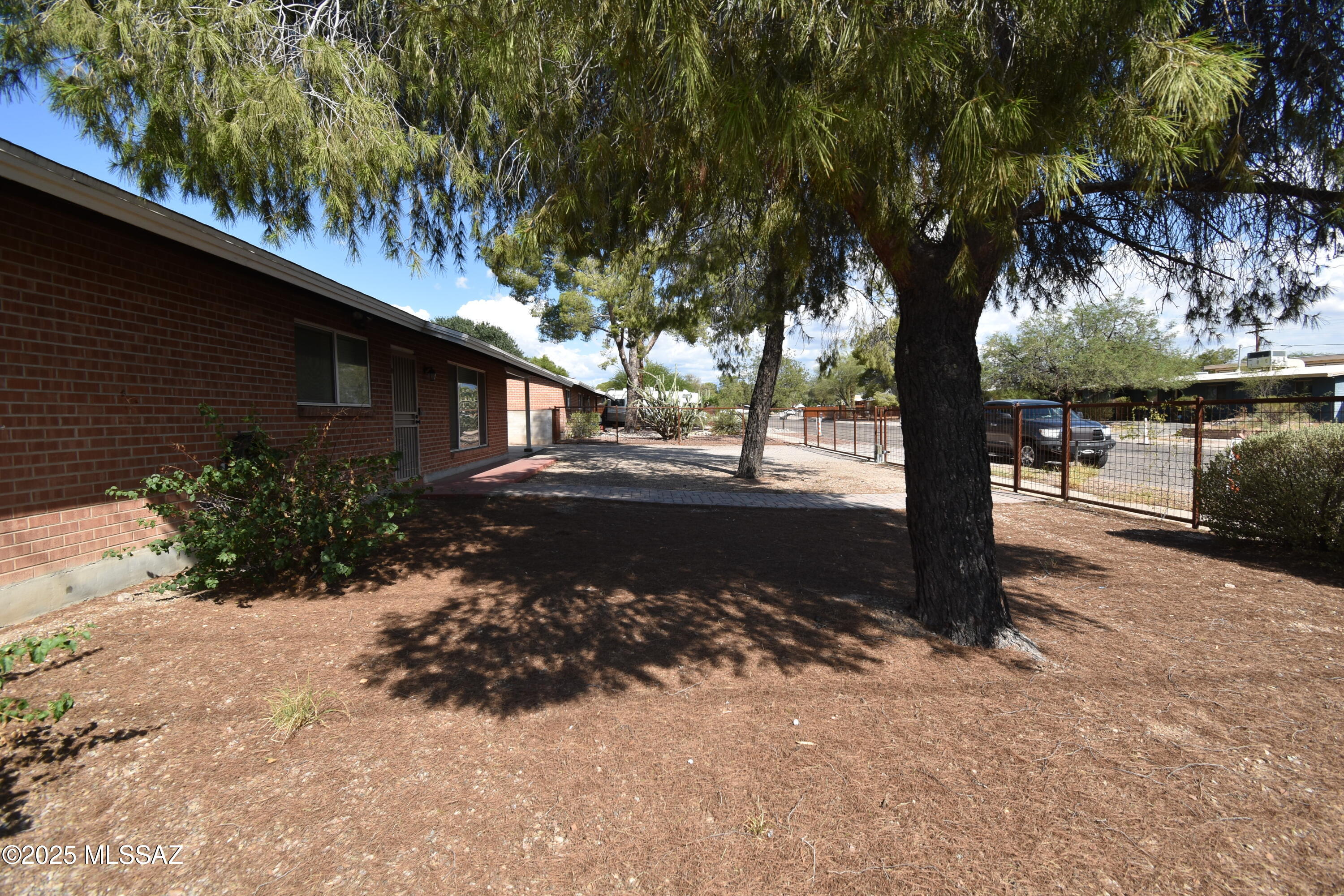 5501 East Spring Street Tucson, AZ 85712 - Photo 9 of 32 a view of street with trees