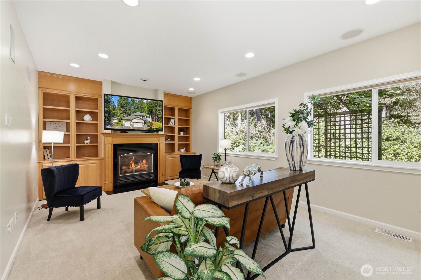 4354 Northwest Westgate Road Silverdale, WA 98383 - Photo 15 of 40 a living room with furniture and a fireplace