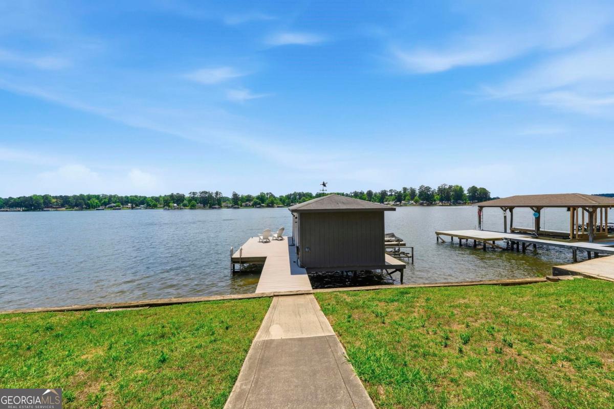 172 Mays Road Milledgeville, GA 31061 - Photo 42 of 54 a view of a lake with a yard