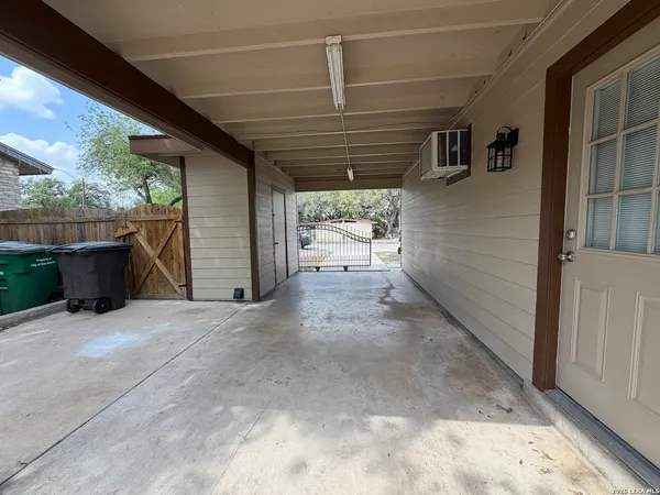 a view of a porch of a house