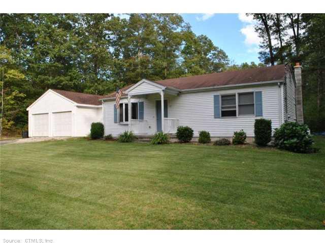 40 Goodwin Road, Unit 2 Canterbury, CT 06331 - Photo 1 of 1 a front view of a house with a garden