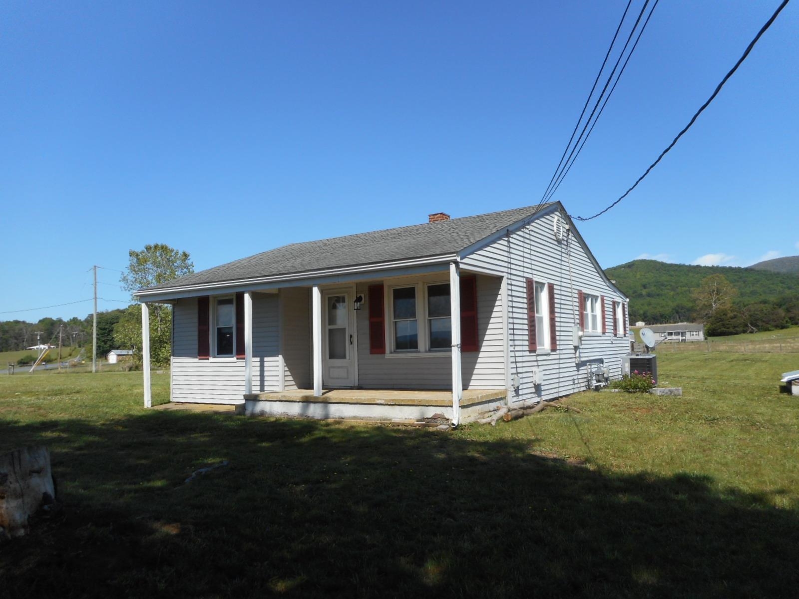 18874 Huckleberry Road Elkton, VA 22827 - Photo 2 of 23 a front view of a house with a yard