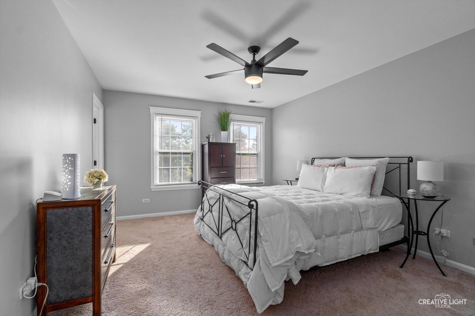 895 Lowell Lane Naperville, IL 60540 - Photo 14 of 40 a bedroom with a bed and window