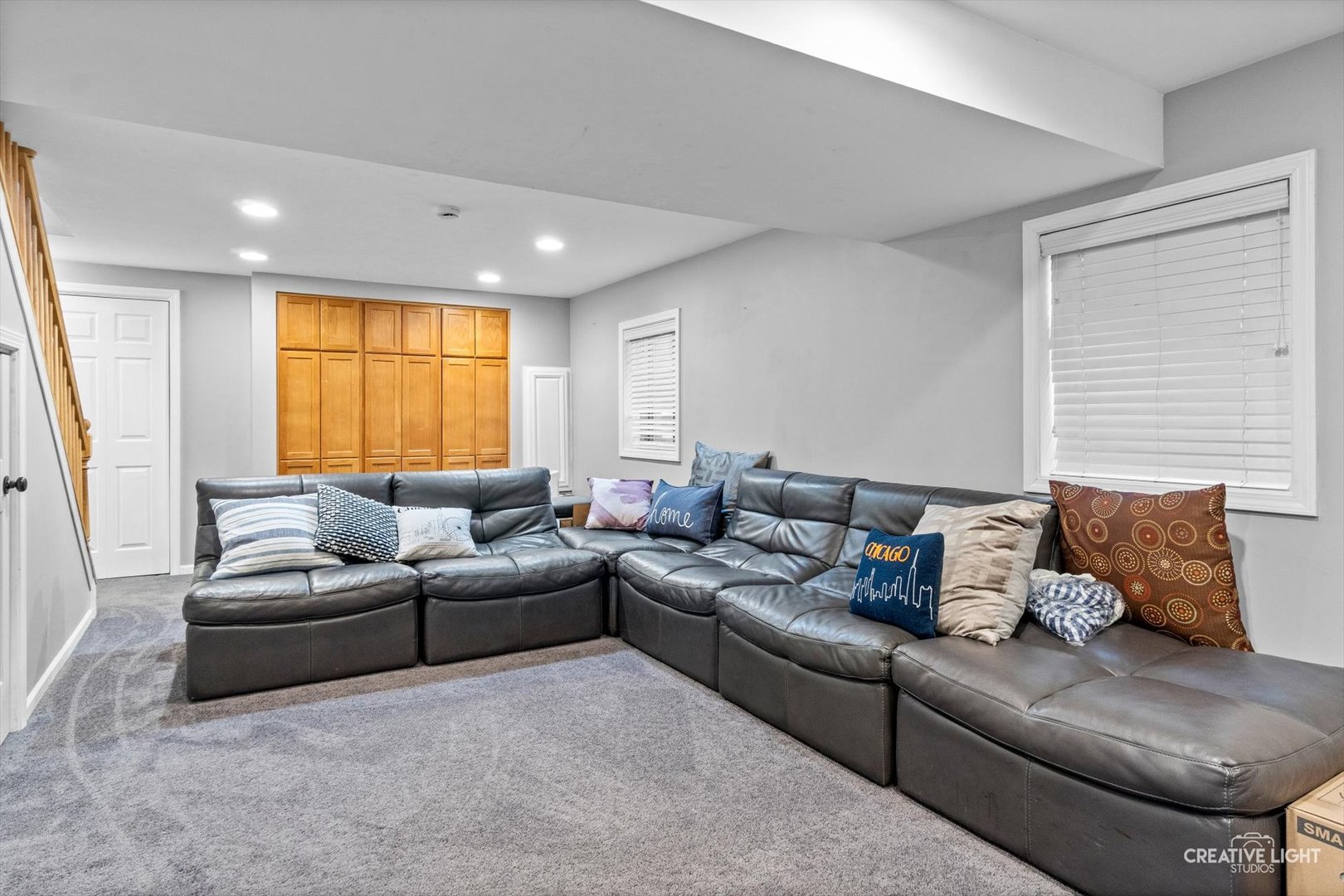 895 Lowell Lane Naperville, IL 60540 - Photo 22 of 40 a living room with furniture and a large window