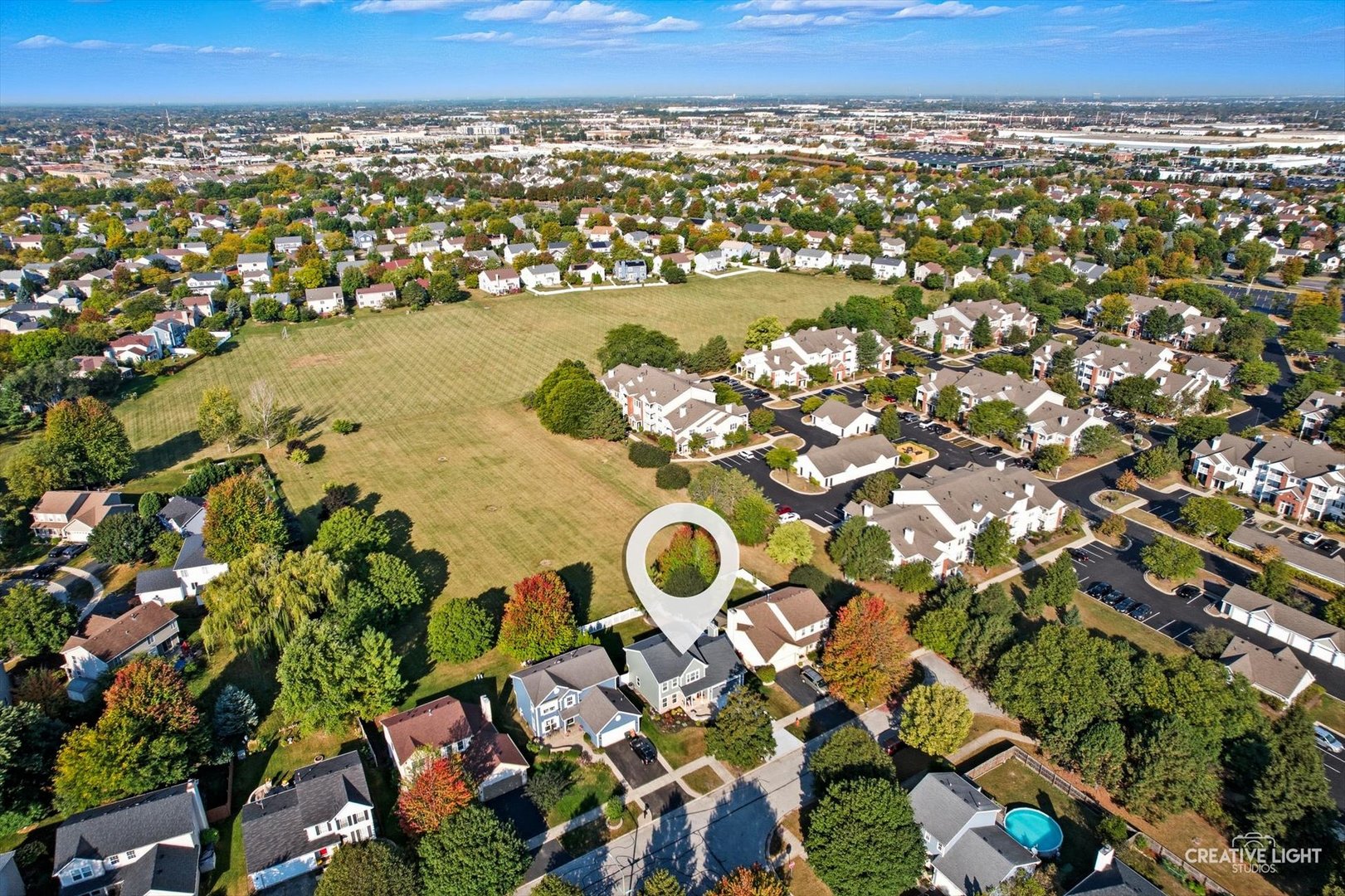 895 Lowell Lane Naperville, IL 60540 - Photo 30 of 40 an aerial view of a house with a lake view