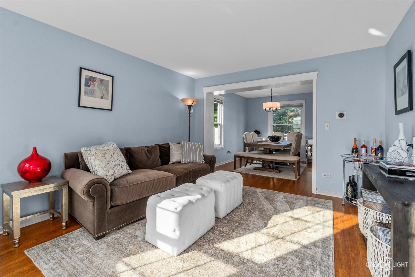 895 Lowell Lane Naperville, IL 60540 - Photo 4 of 40 a living room with furniture and a wooden floor