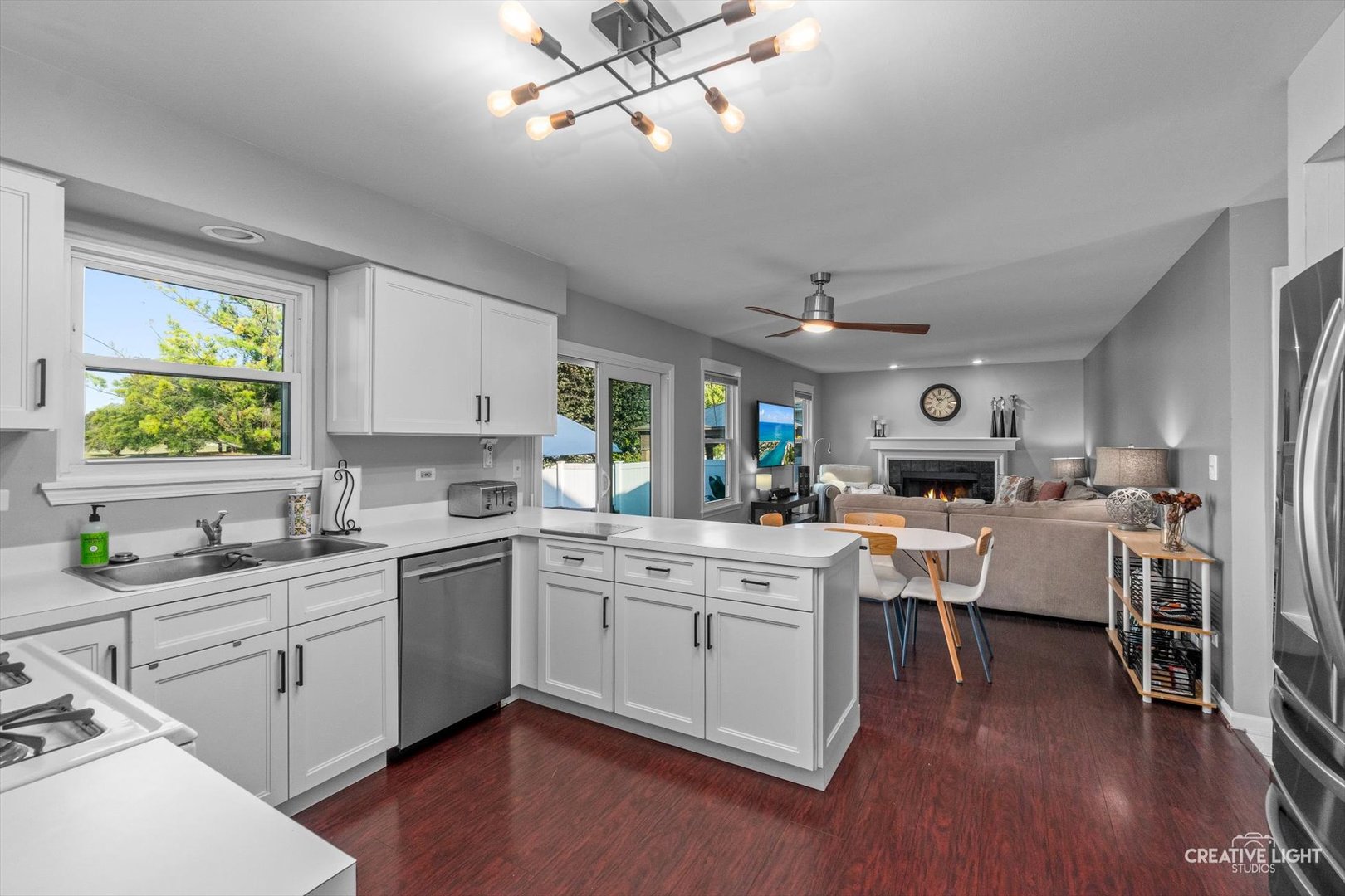895 Lowell Lane Naperville, IL 60540 - Photo 8 of 40 a kitchen with a sink cabinets and wooden floor