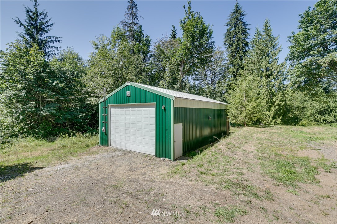 16623 Three Lakes Road Snohomish, WA 98290 - Photo 25 of 36 a view of a garage