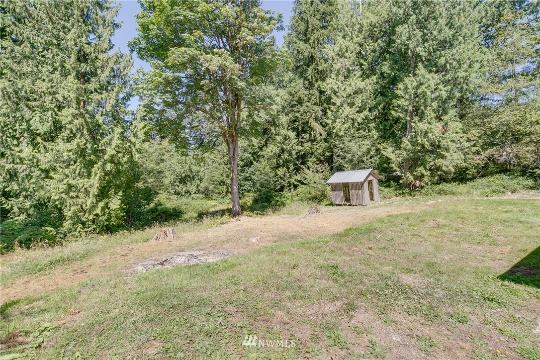 16623 Three Lakes Road Snohomish, WA 98290 - Photo 28 of 36 a view of a trees with a yard