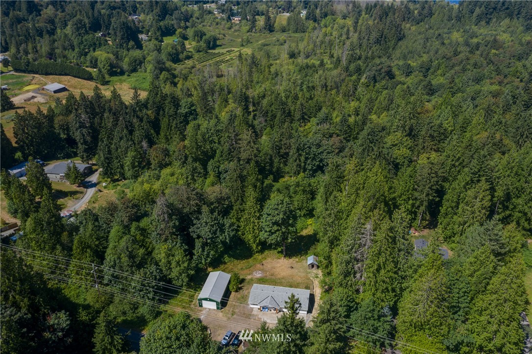16623 Three Lakes Road Snohomish, WA 98290 - Photo 32 of 36 an aerial view of a house with a yard