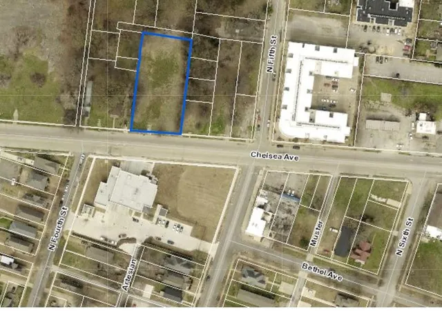 a view of a bathroom with a sink and a mirror