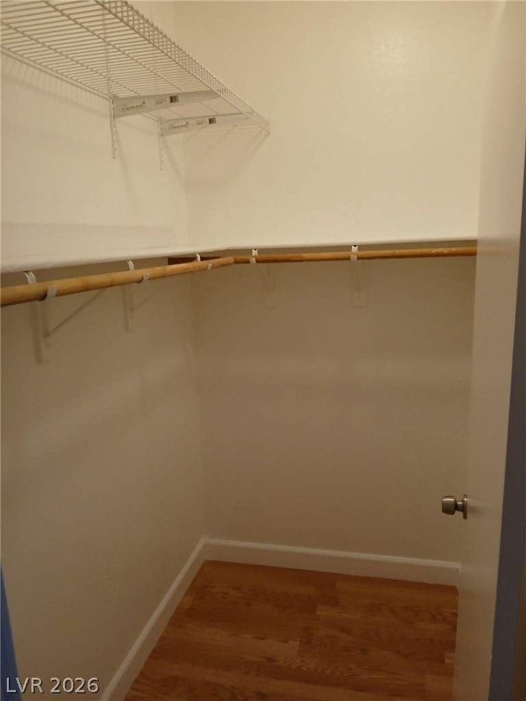 2201 Ramsgate Drive, Unit 426 Henderson, NV 89074 - Photo 9 of 22 An organized closet offers ample storage with durable shelving and hardwood-style flooring.