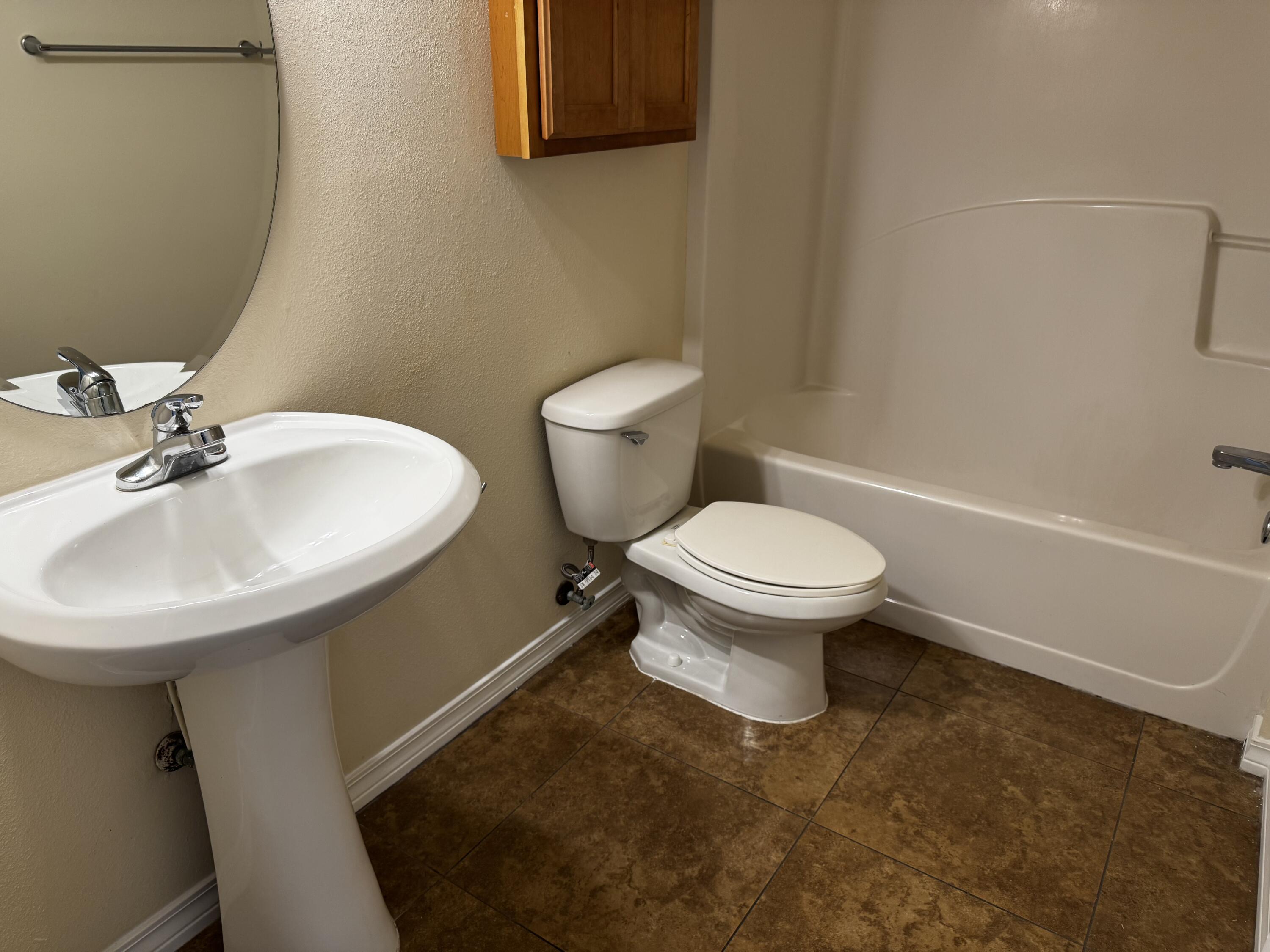 1512 Bentley Circle Fort Walton Beach, FL 32547 - Photo 11 of 12 a bathroom with a sink and a toilet