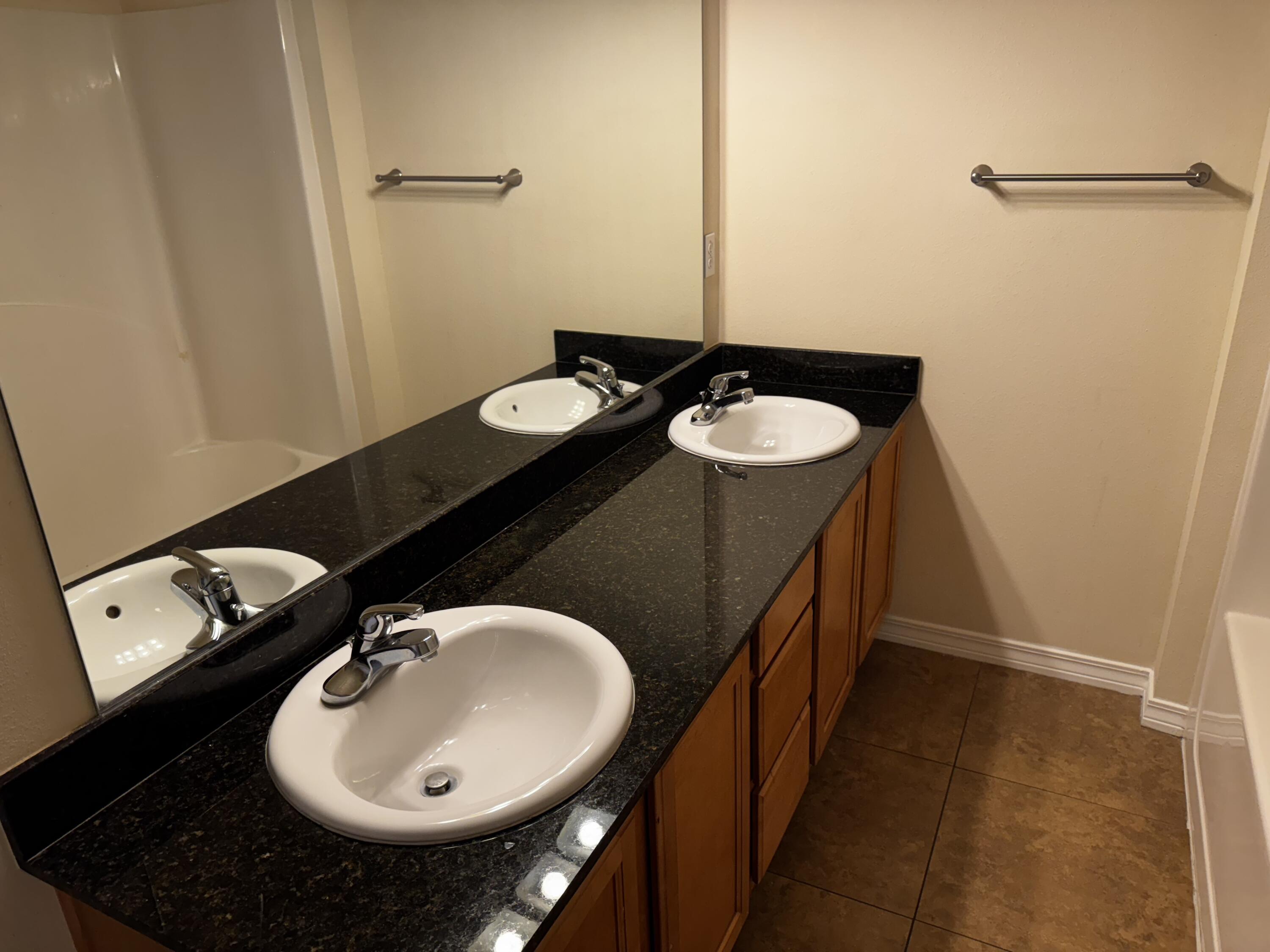 1512 Bentley Circle Fort Walton Beach, FL 32547 - Photo 12 of 12 a bathroom with a sink and a mirror