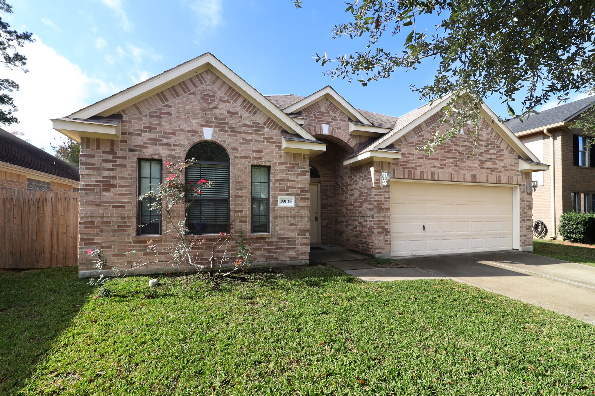 3-sided brick 1-story home in the quiet and gated community of Spring Park Village