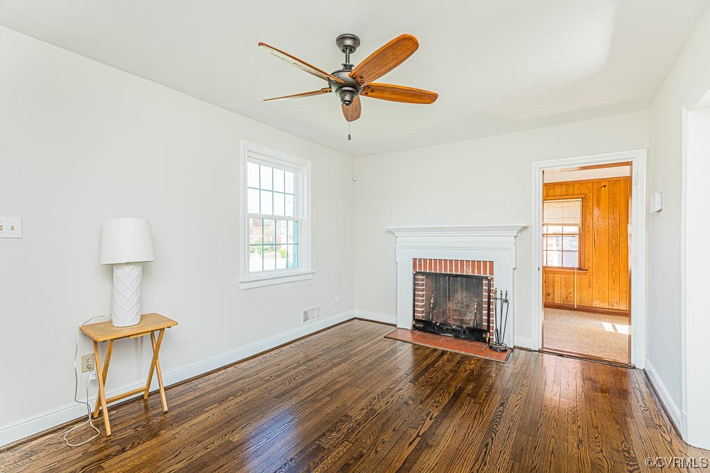 2317 New Berne Road Henrico, VA 23228 - Photo 11 of 37 a view of an empty room with a fireplace and a window