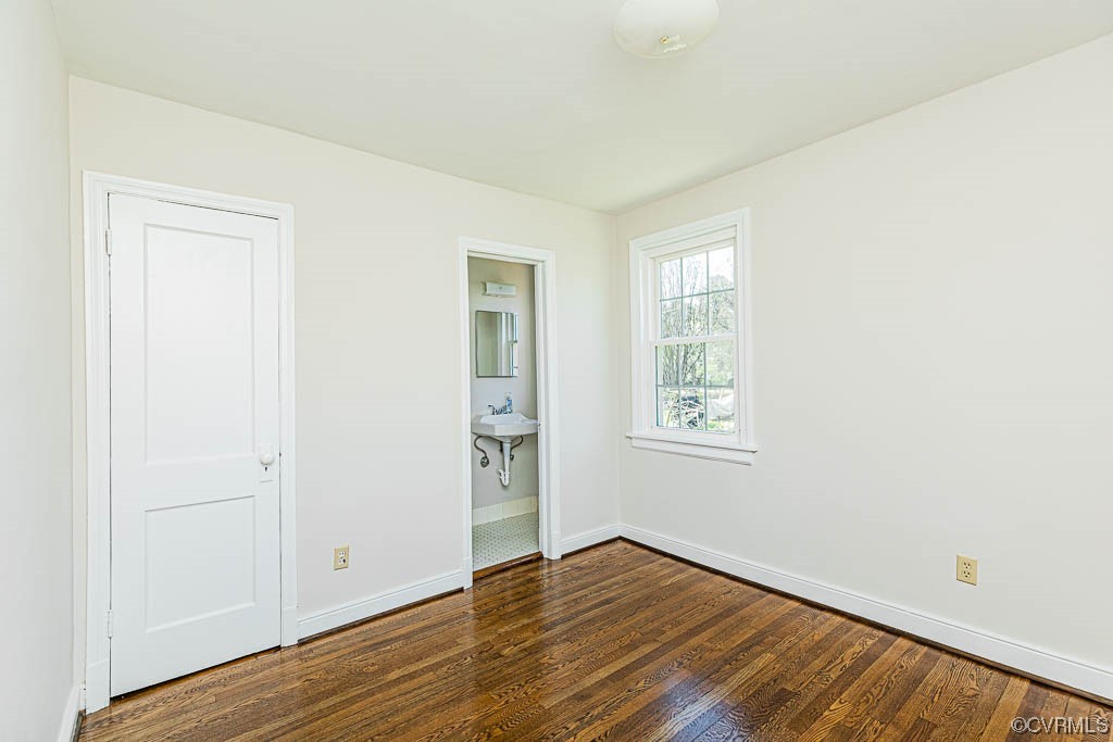 2317 New Berne Road Henrico, VA 23228 - Photo 16 of 37 an empty room with wooden floor and windows